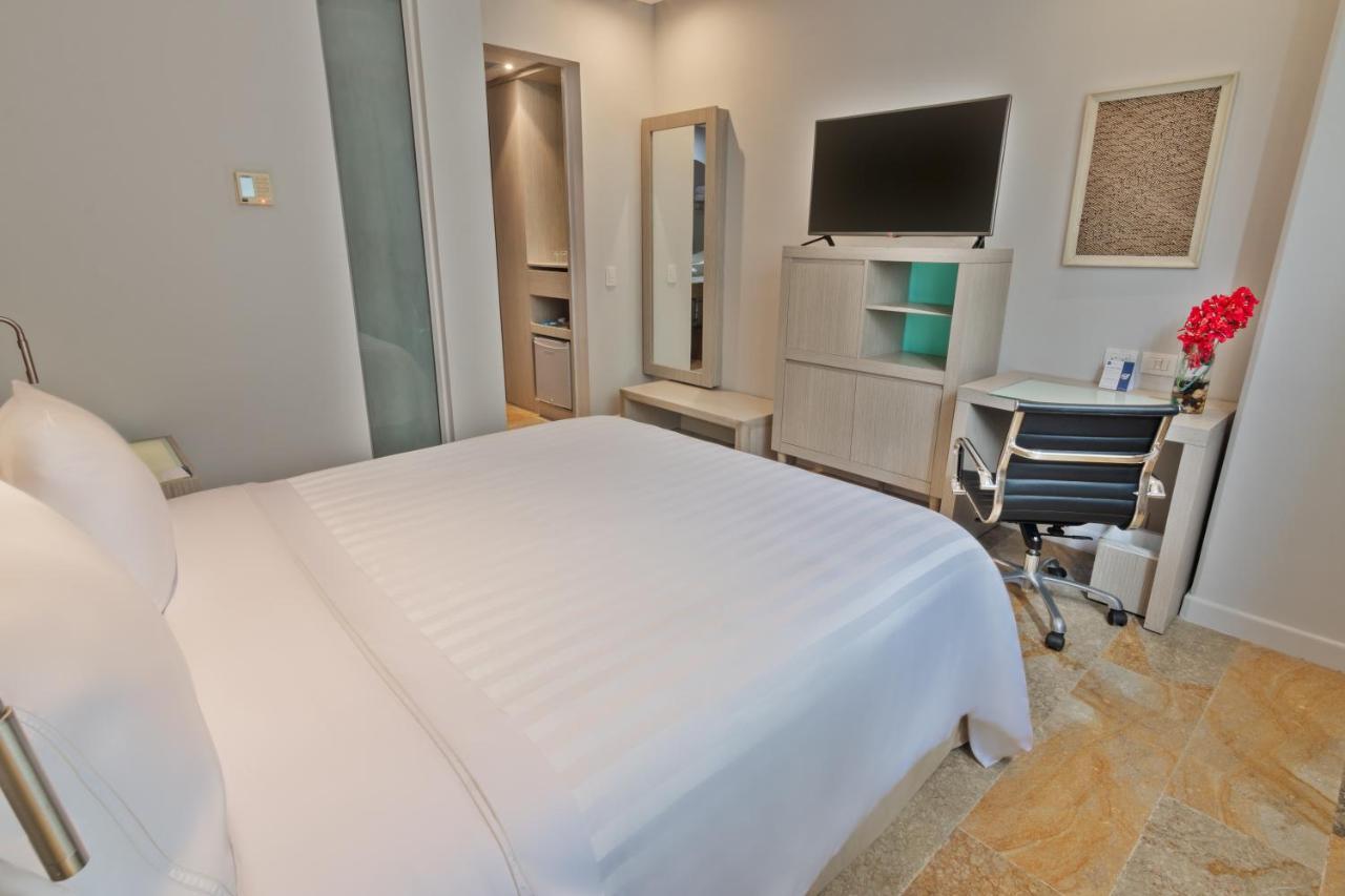 Ghl Hotel Monteria Exterior photo A bedroom