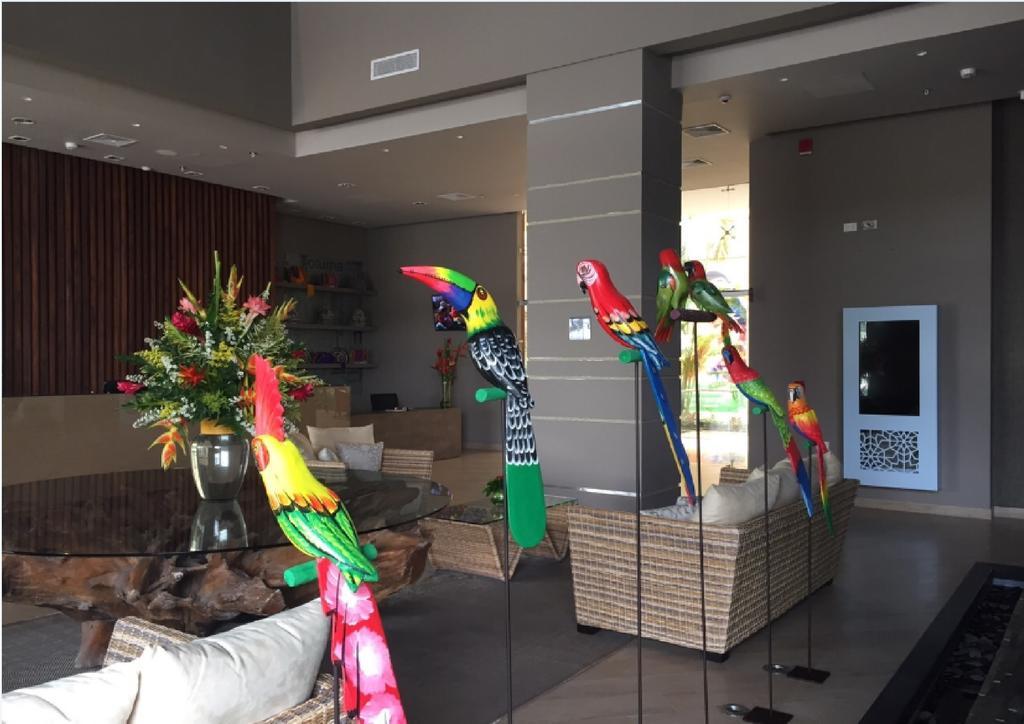 Ghl Hotel Monteria Exterior photo Parrots at the lobby