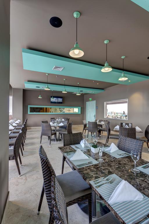 Ghl Hotel Monteria Exterior photo Restaurant