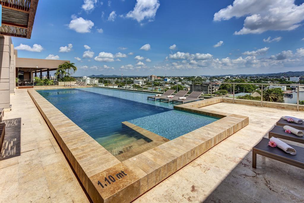 Ghl Hotel Monteria Exterior photo Infinity pool at the rooftop